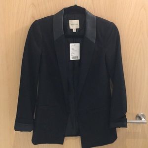 Nice black blazer with faux leather trim